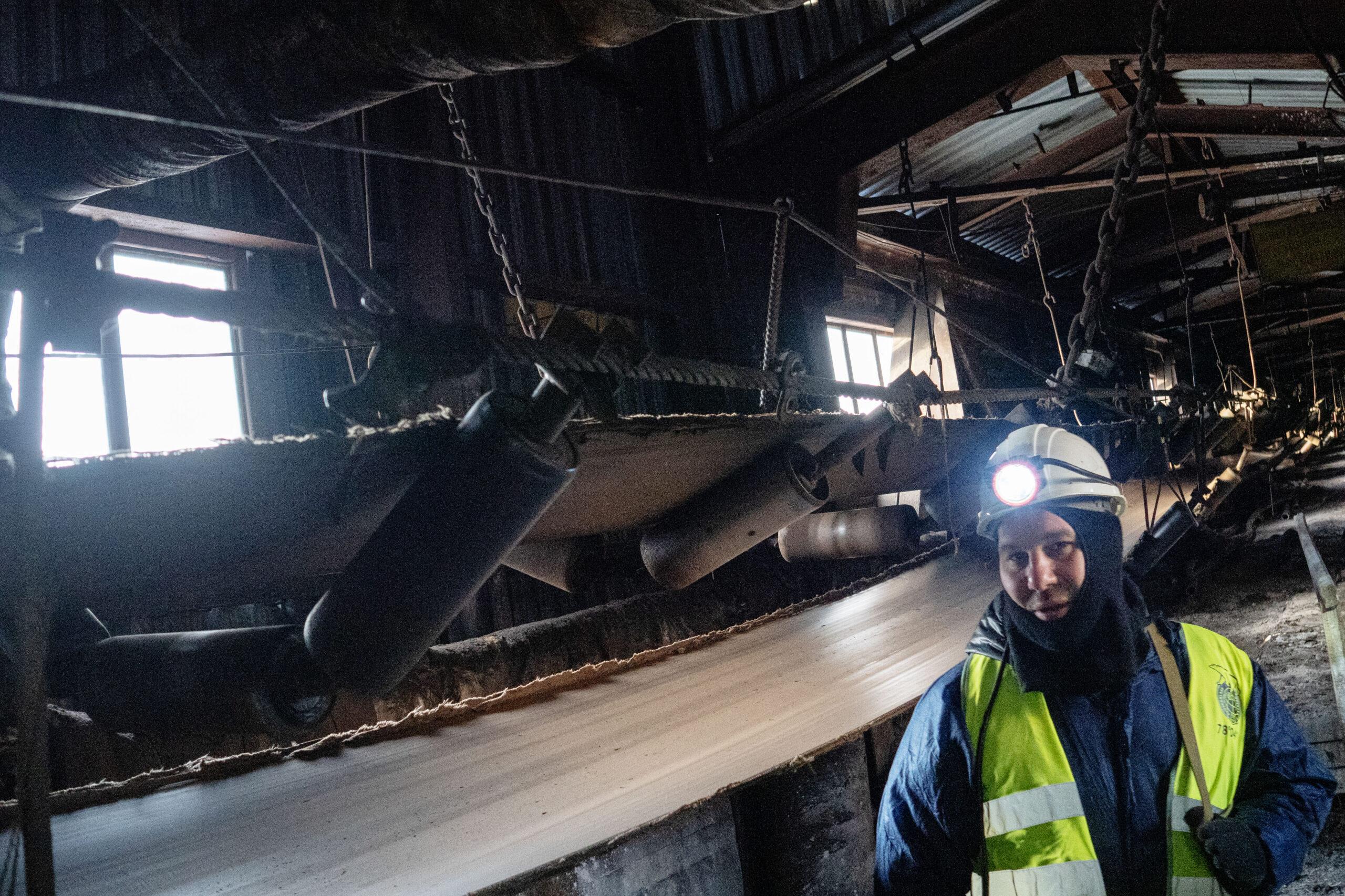 A Russian tour guide gives a tour of the Trust Arcticugol, a Russian state run coal mine in Svalbard, Norway.
